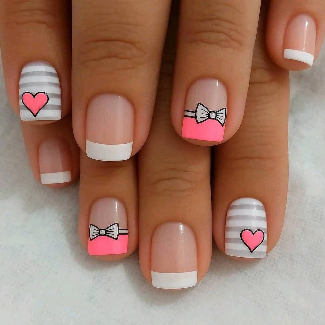 Artificial nails with playful heart and bow pattern Stornfield