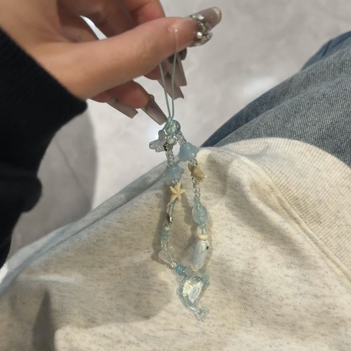 Dolphin-Themed Beaded Charm Eyewear Holder Stornfield