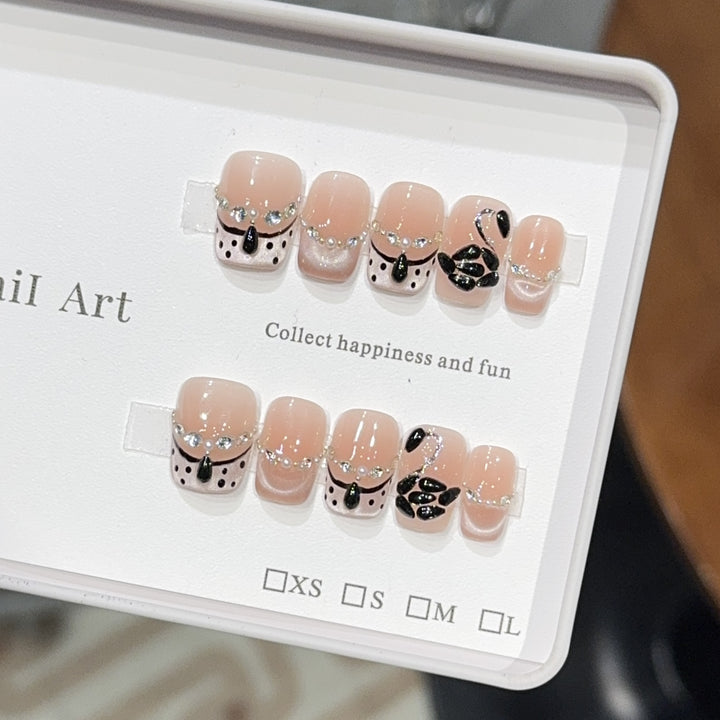 Elegant artificial nails with flower décor and glitter Stornfield