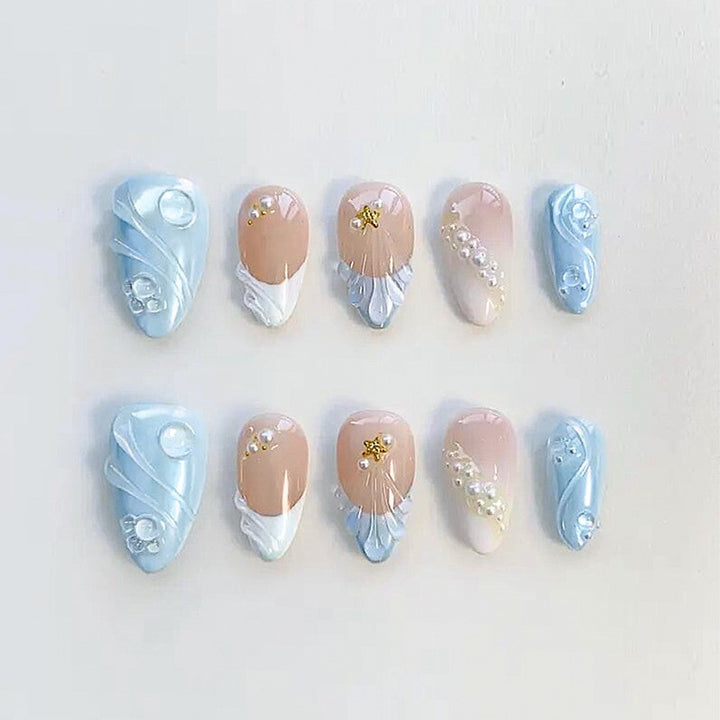 creative nail art set with maritime motifs and sparkling accents Stornfield