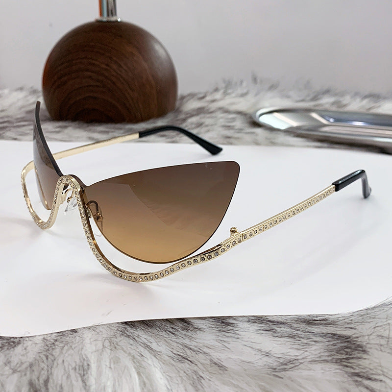 Women's extravagantly shaped Cat-Eye sunglasses with sparkling appliqués Stornfield
