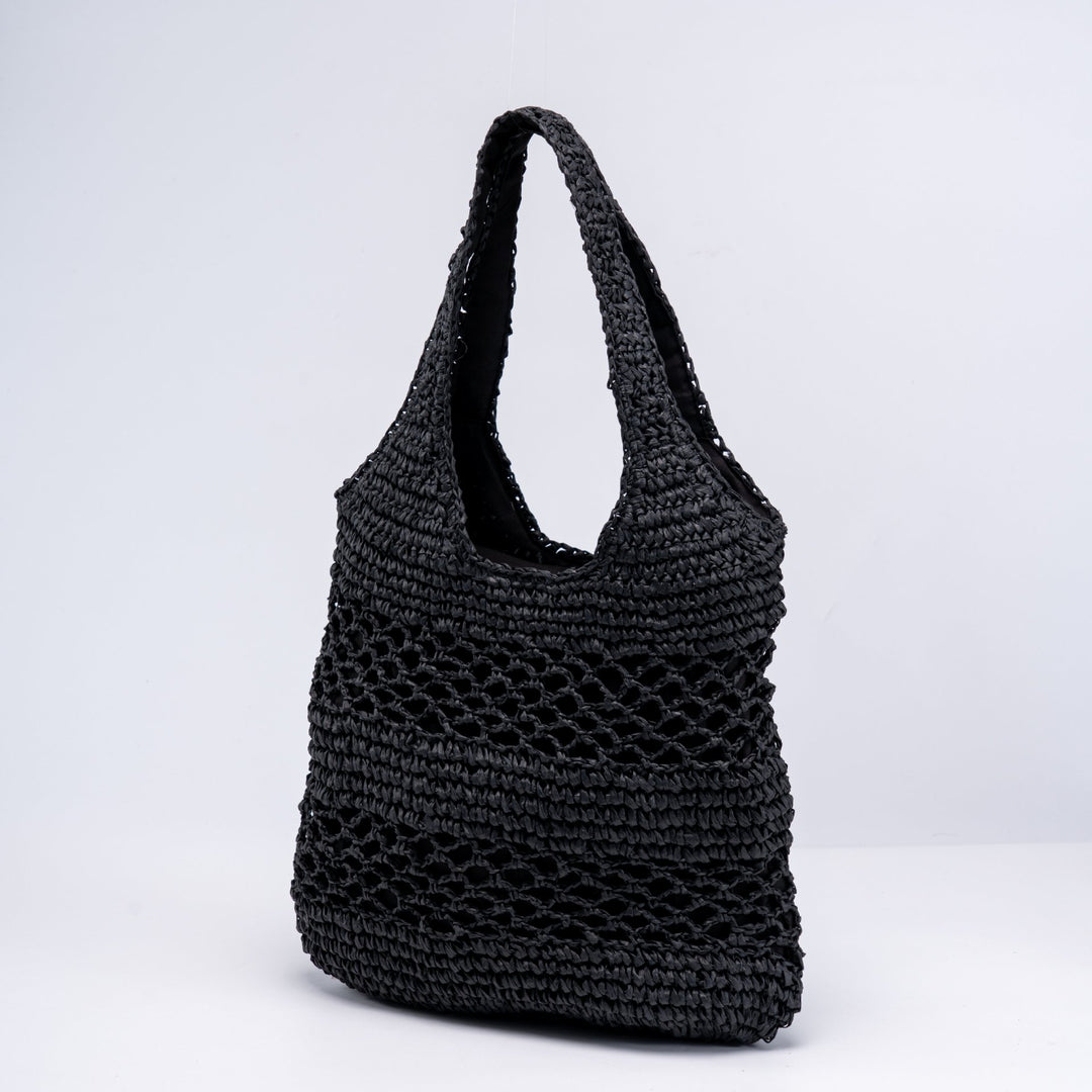 Handwoven beach bag with open mesh structure Stornfield