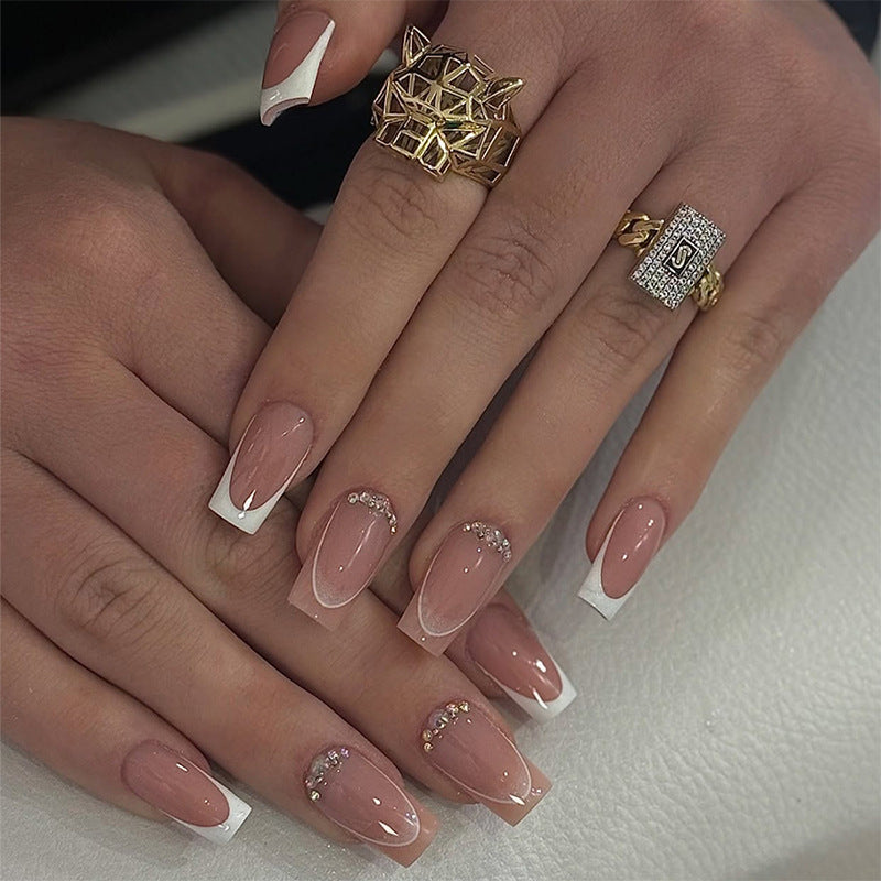 Artificial nail set with elegant ombre accents and seductive rhinestones Stornfield