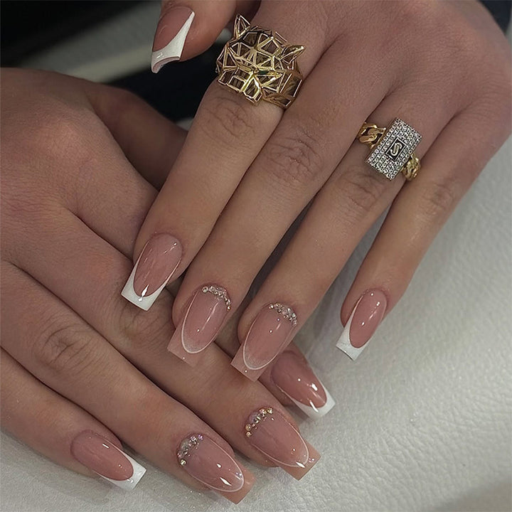 Artificial nail set with elegant ombre accents and seductive rhinestones Stornfield