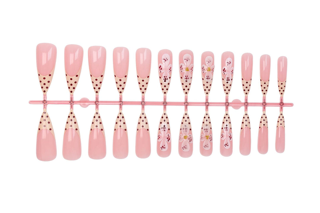 Art nail set with elegant flower and dot designs Stornfield