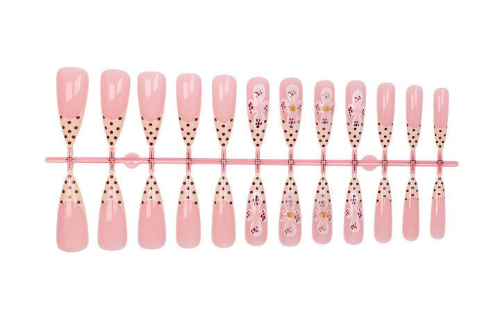 Art nail set with elegant flower and dot designs Stornfield