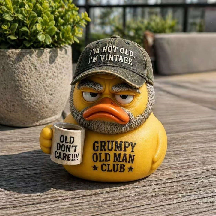Funny rubber duck with vintage hat and cup Stornfield