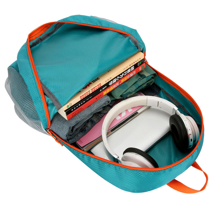 Unisex nan ultra-light foldable day backpack with organizer compartments, water-repellent material, and mesh side pockets Stornfield