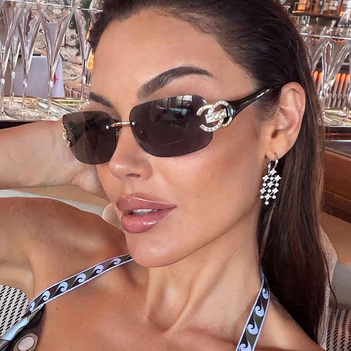 Women's fashionable sunglasses with luxurious geometric frame and protective UV filter Stornfield