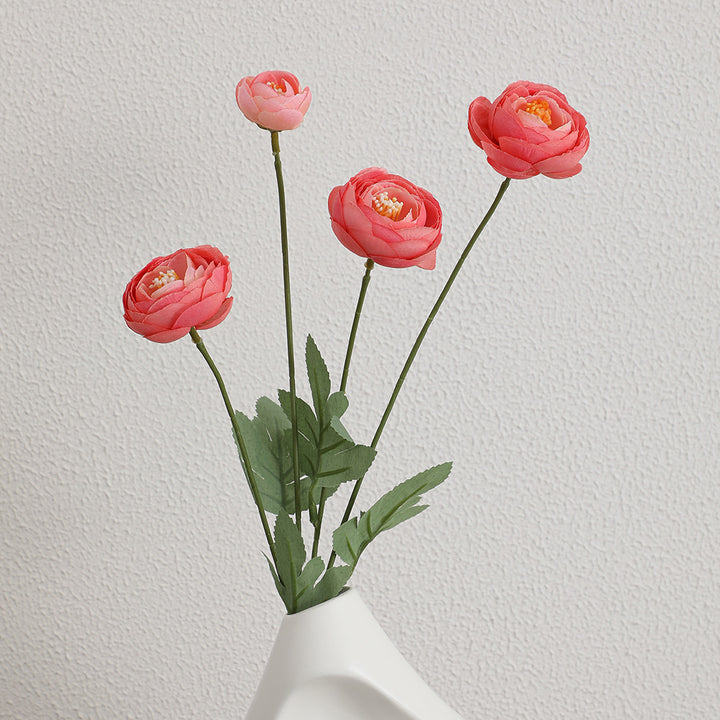 Decorative artificial flower bouquet with intricately detailed ranunculus