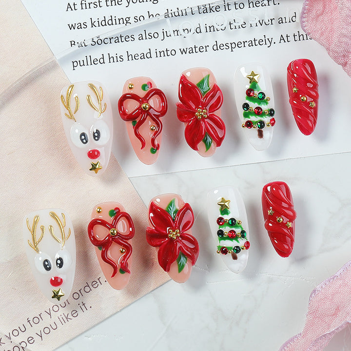 Creative Christmas Art Nail Set with Festive Designs and Glitter Accents Stornfield
