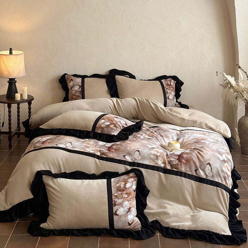 Satin bedding set with ruffle trim and floral butterfly design
