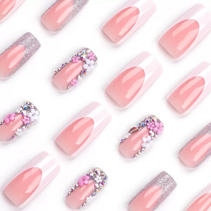 Artificial nail set with elegant 3D flowers and glitter embellishments Stornfield