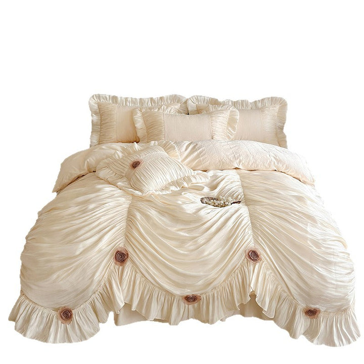 Romantic bedspread set with gathered satin look, frill, and rose appliqués