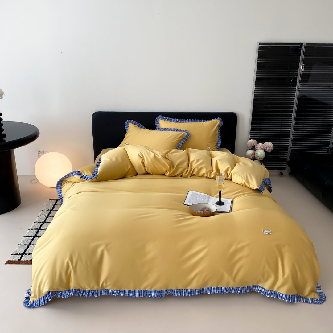 Luxury cotton bedding set with ruffle trim and checkered edging