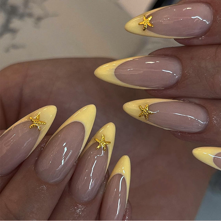 Artificial nail set with elegant tip and golden details Stornfield