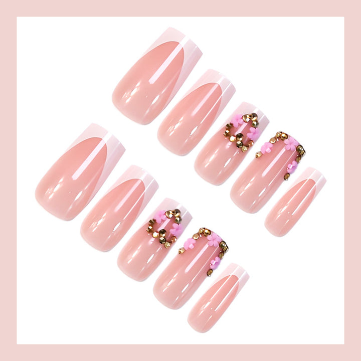 Nail art set with delicate flower and glitter accents Stornfield