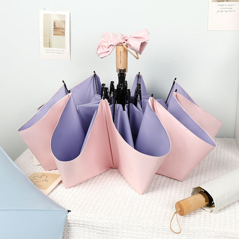 Ladies stylish handheld umbrella with decorative design Stornfield