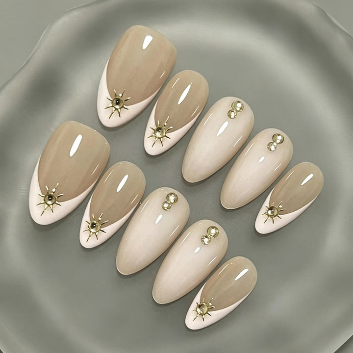 Nail set with elegant design elements and glamorous accents Stornfield