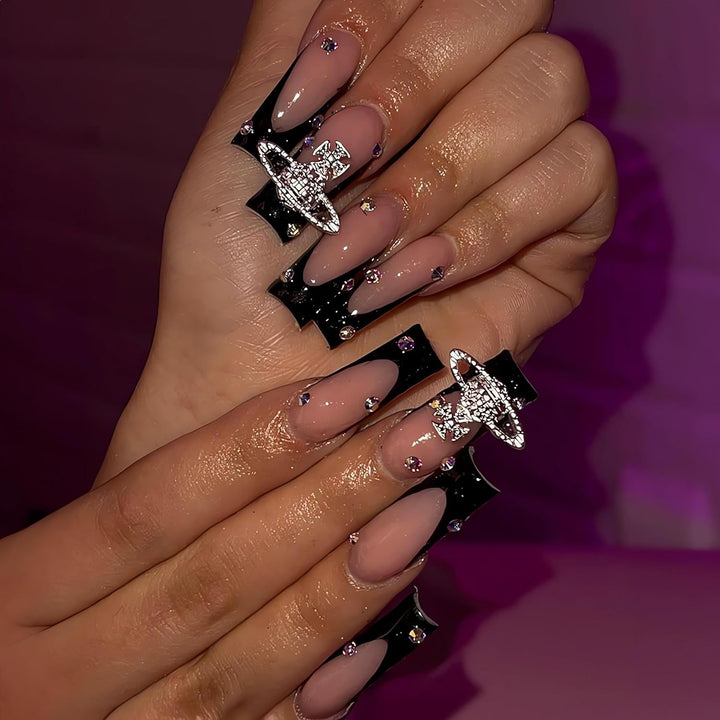 Glamorous artificial nails with rhinestones and unique 3D decorations Stornfield