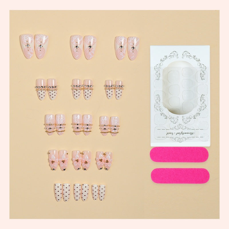 Creative acrylic nail set with elegant decorations Stornfield