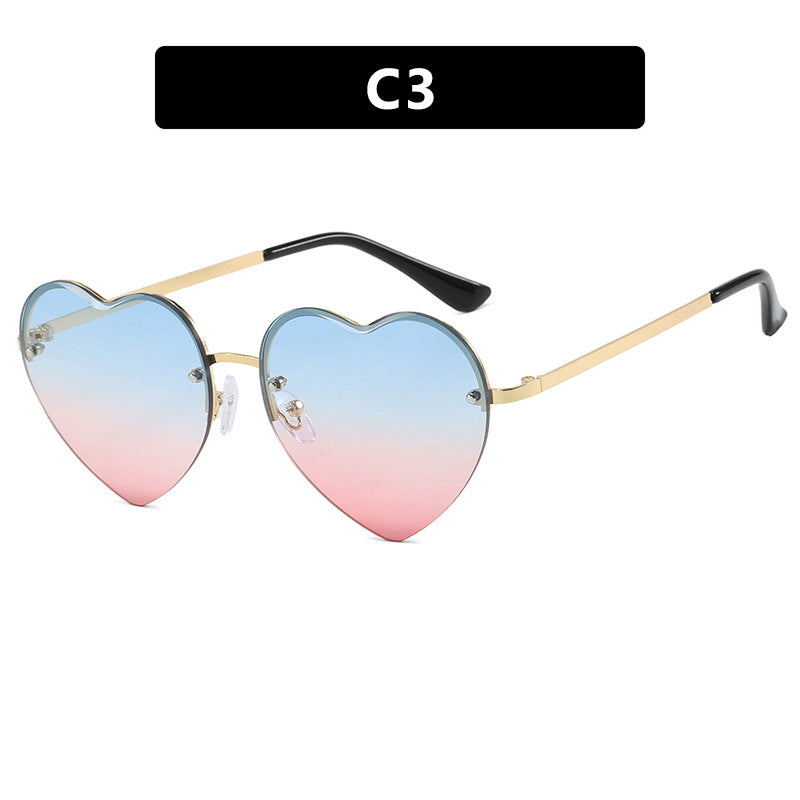 Women's Heart-Shaped Sunglasses with Mirrored Lenses and Fashionable Metal Frame Stornfield