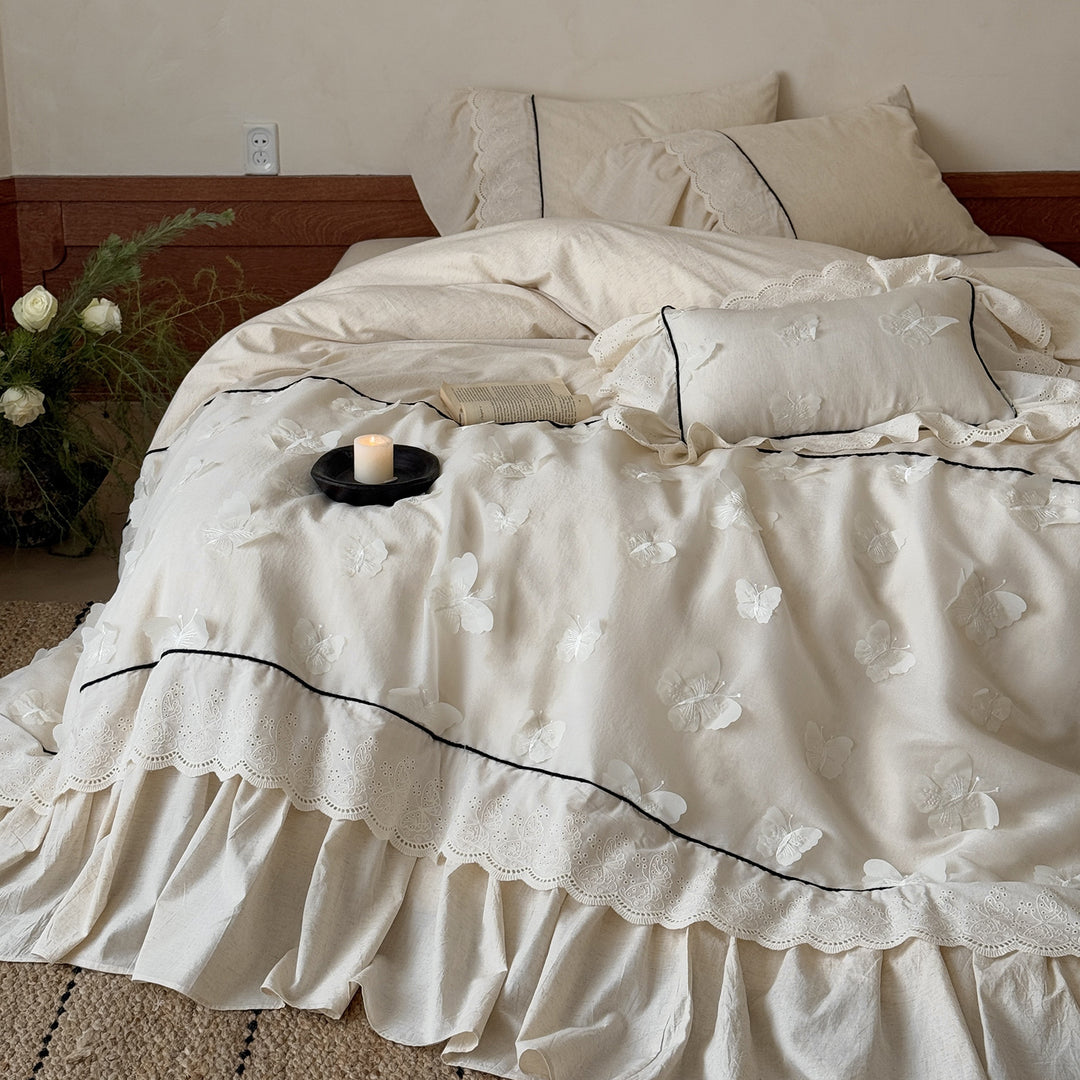 Romantic cotton bedding set with embroidery, lace frill, and fine piping