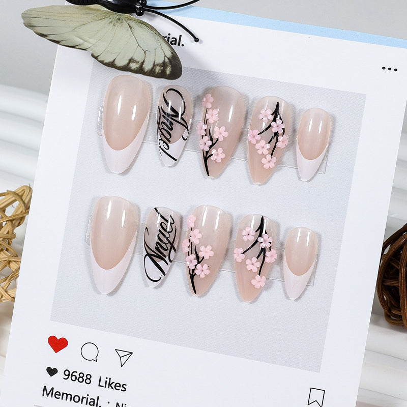 Artificial nails with delicate 3D flowers and elegant design Stornfield
