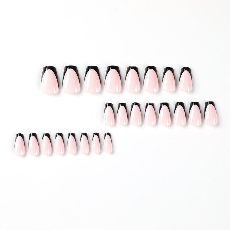 Elegant stiletto nails with contrasting French tip Stornfield