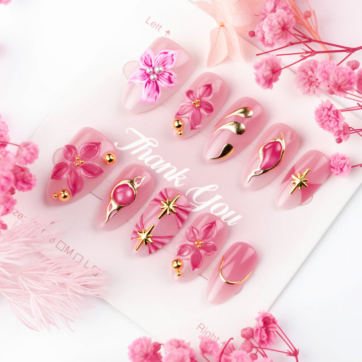 Artificial nails with floral and glamorous details Stornfield