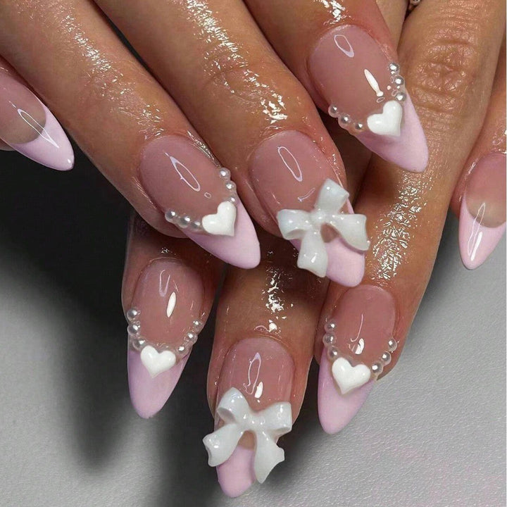 Artificial nail tips with heart and bow decorations Stornfield