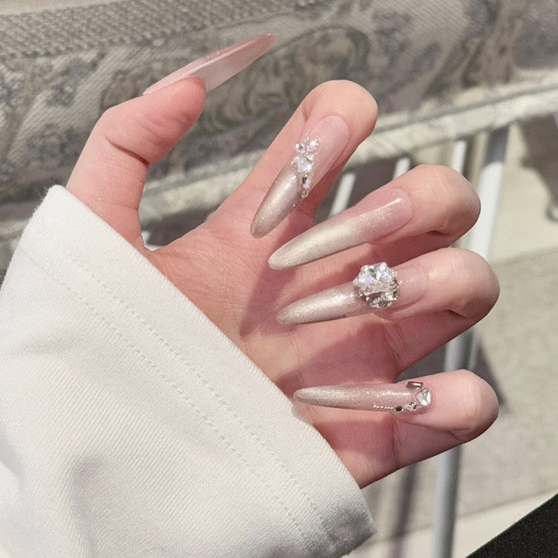 Artificial nail set with elegant tips and crystal accents Stornfield