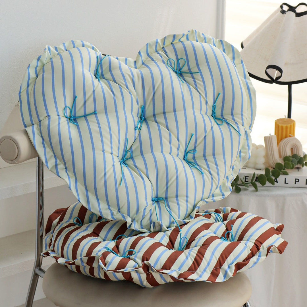 Heart-shaped floor cushion with quilted tufted upholstery and checkered satin cover Stornfield