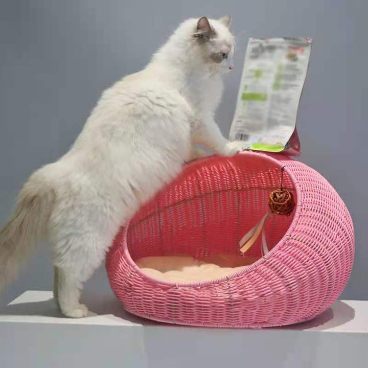 Cozy cat bed made of woven natural material Stornfield