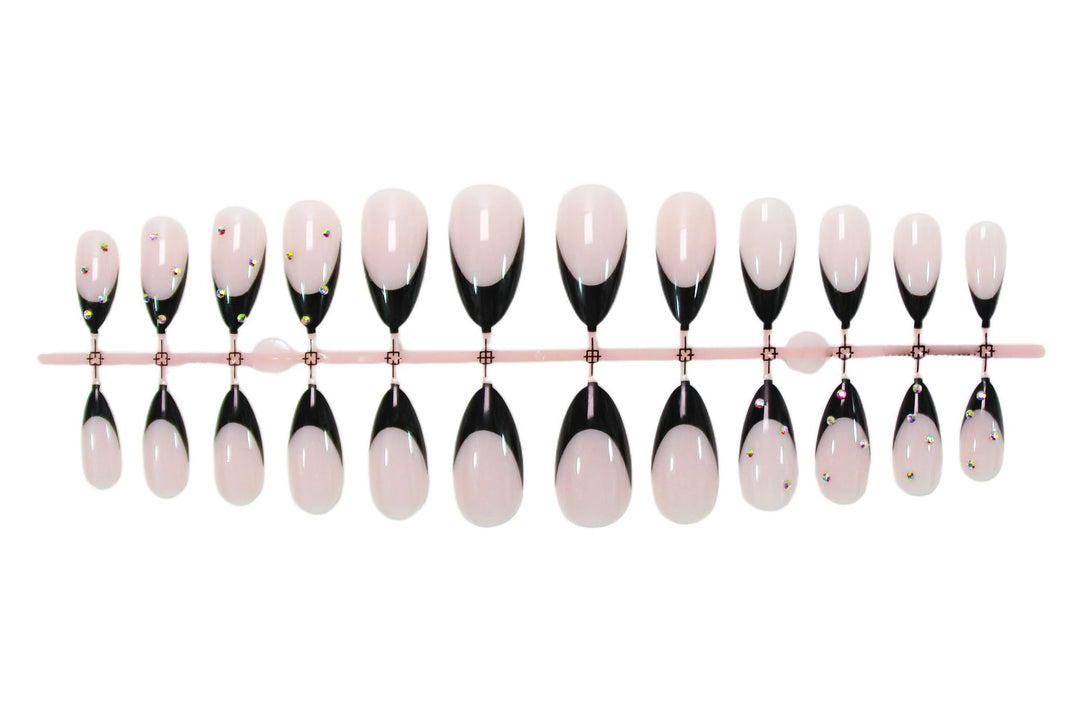 Artificial nail set with elegant tips and glamorous decorations Stornfield