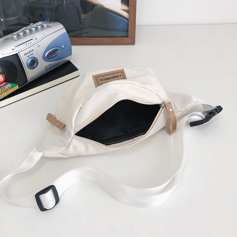 Sleek Multi-Compartment Sling Bag