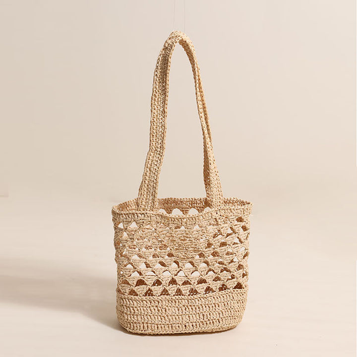Handcrafted net straw bag with elegant straps Stornfield
