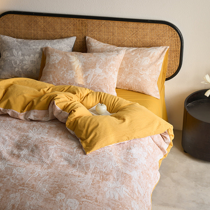 Reversible cotton bedding set with floral toile print and linen look