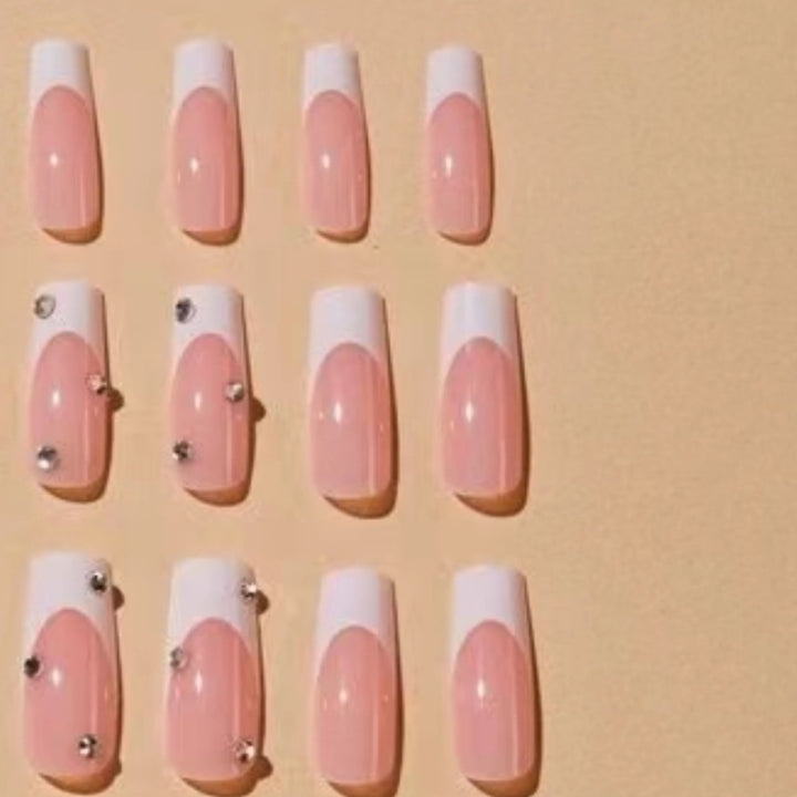 Elegant Glitter-Embellished French Tip Acrylic Nails Stornfield
