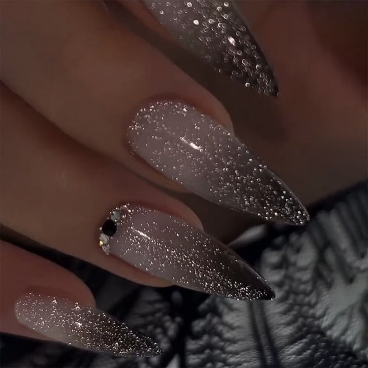 Glamorous artificial nails with sparkling accents Stornfield