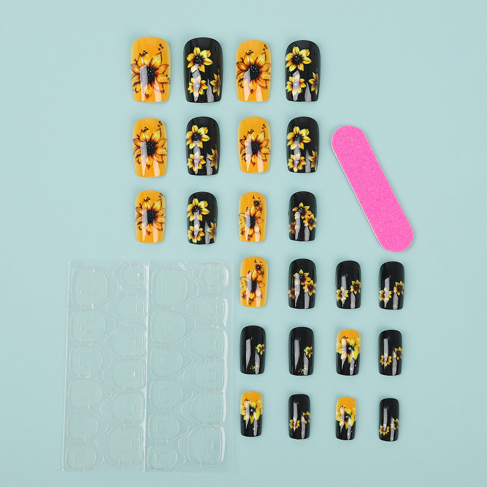 Artificial nails in floral design with sunflower motif Stornfield