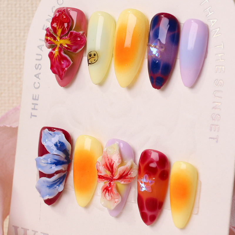 Artificial nail set with floral 3D accents and colorful designs Stornfield