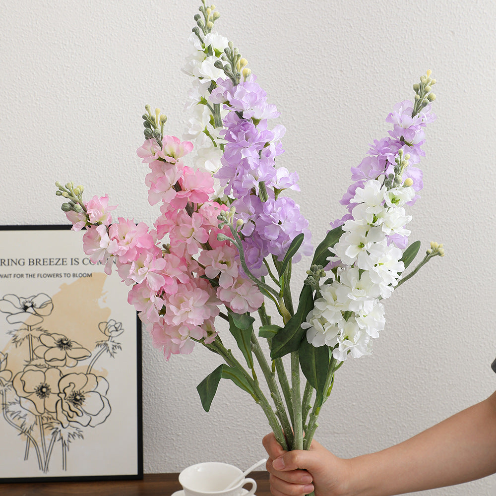 Artificial orchid bouquet with realistic flowers