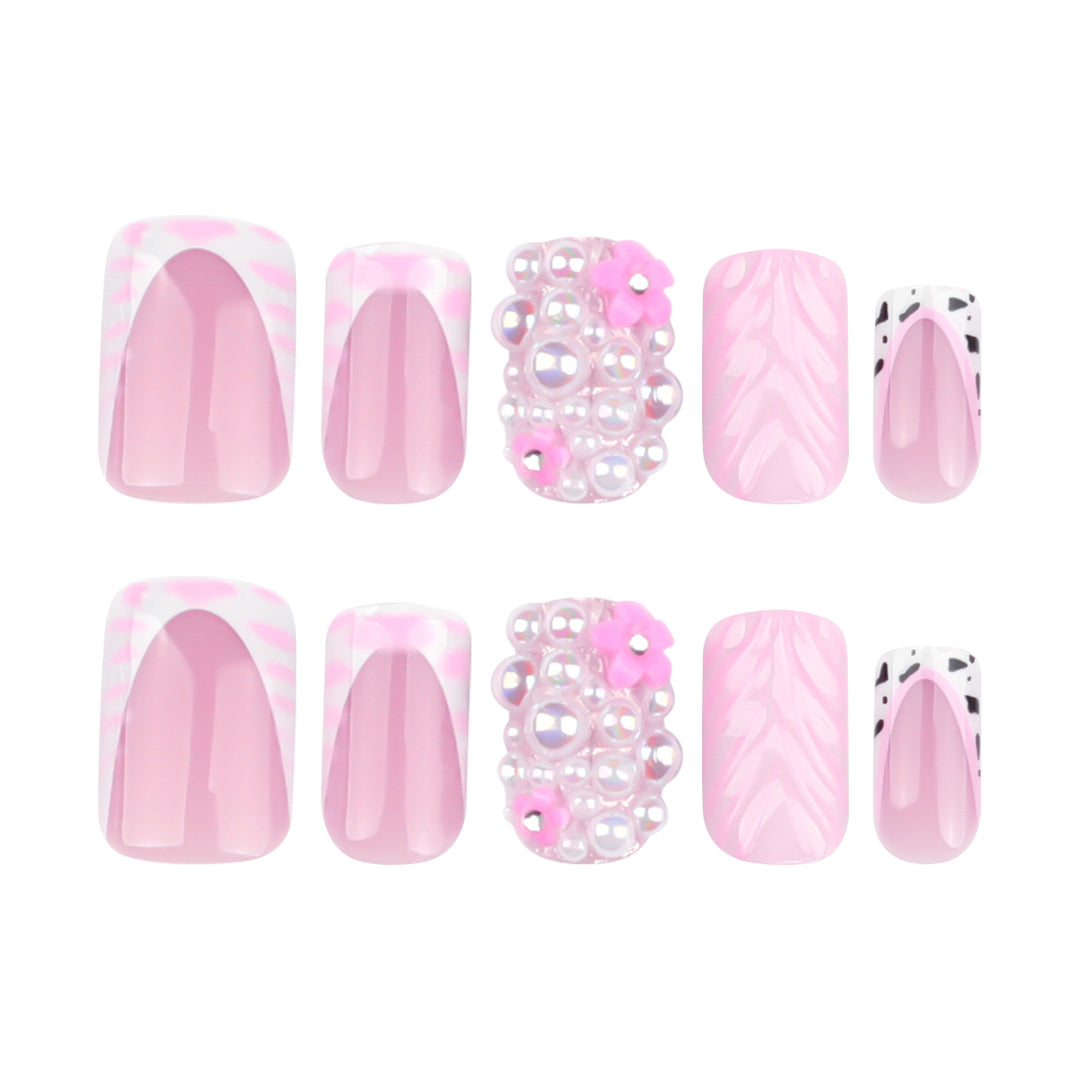 Artful nail extensions with mother-of-pearl effects and delicate design Stornfield