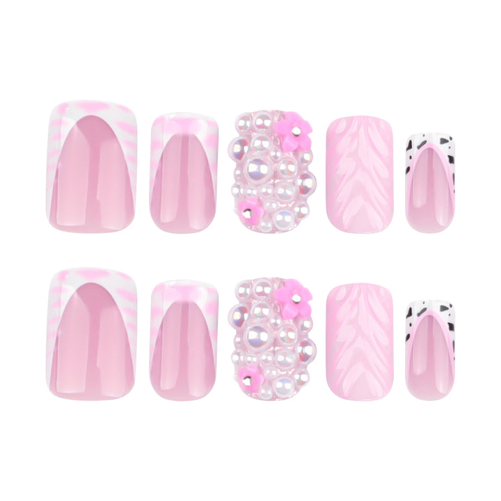 Artful nail extensions with mother-of-pearl effects and delicate design Stornfield