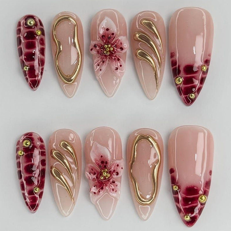 Creative nail art set with floral embellishments and glamorous accents Stornfield