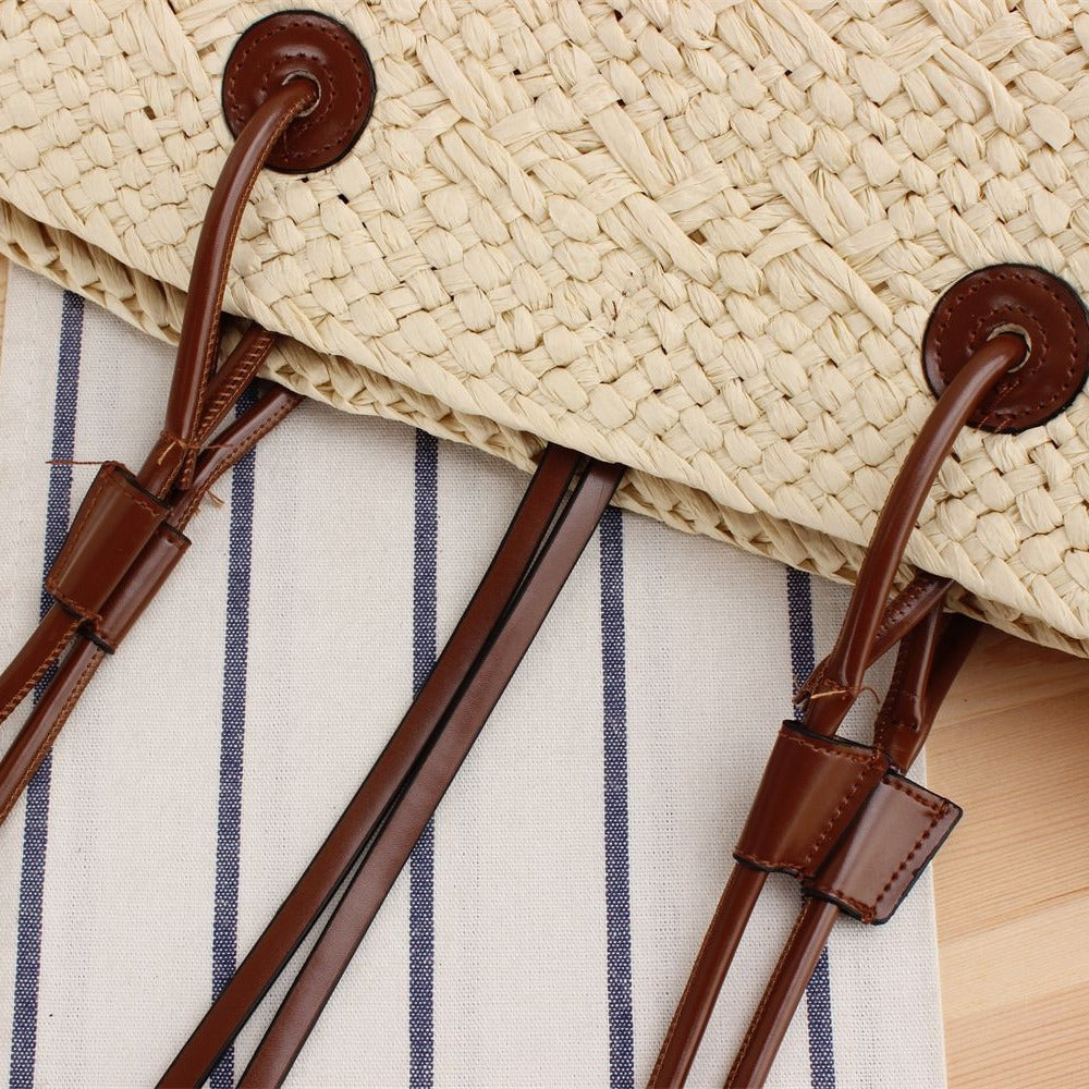 Beach bag made of high-quality braided straw with stylish leather handles Stornfield