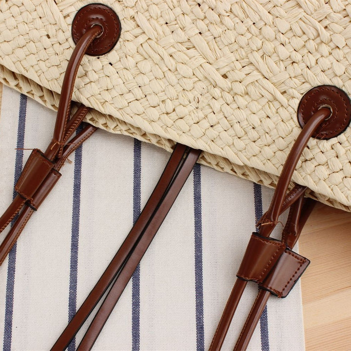 Beach bag made of high-quality braided straw with stylish leather handles Stornfield
