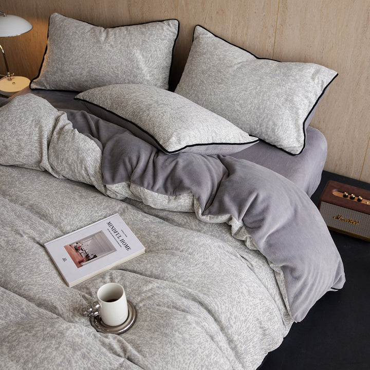 Premium bedding set made of breathable cotton blend with contrast piping