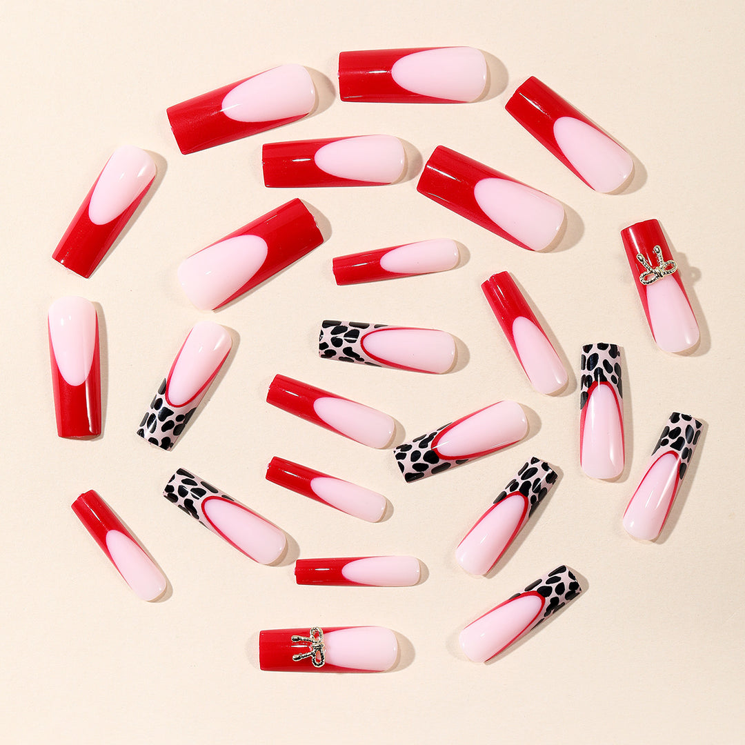 Stylish Acrylic Nail Extensions with Bow and Leopard Print Stornfield